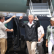 President Donald Trump and Melania Trump arrive on Air Force One at the Muniz Air National Guard Base for a visit after Hurricane Maria hit the island on October 3, 2017 in Carolina, Puerto Rico (Photo by Joe Raedle/Getty Images)
